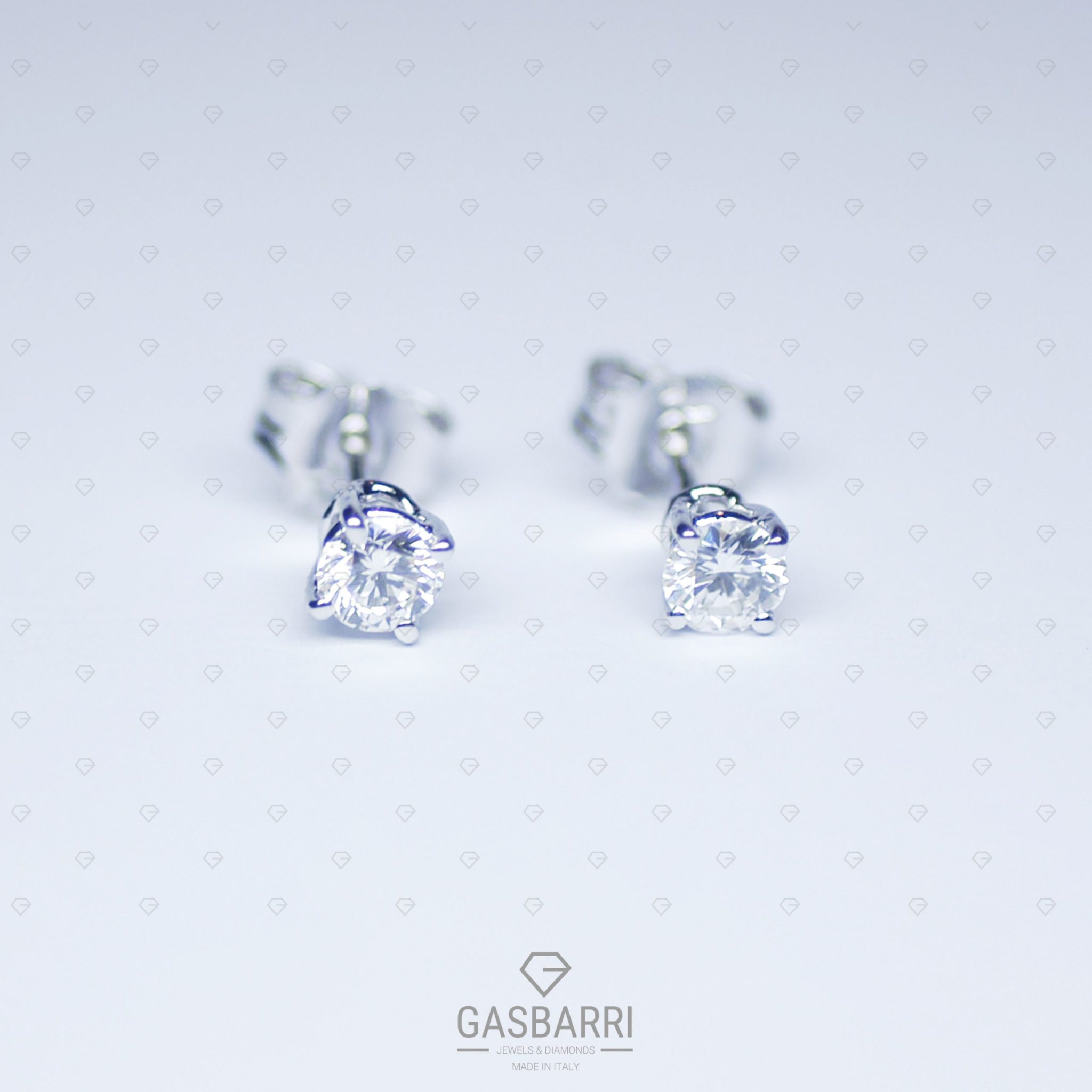 Orecchini con 2 Diamanti mezzo carato F-VS1